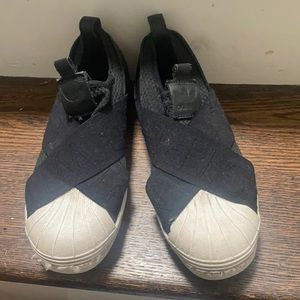 black adidas cross shoes
